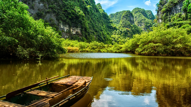 Amazed By The System Of Caves And Limestone Mountains In Trang An